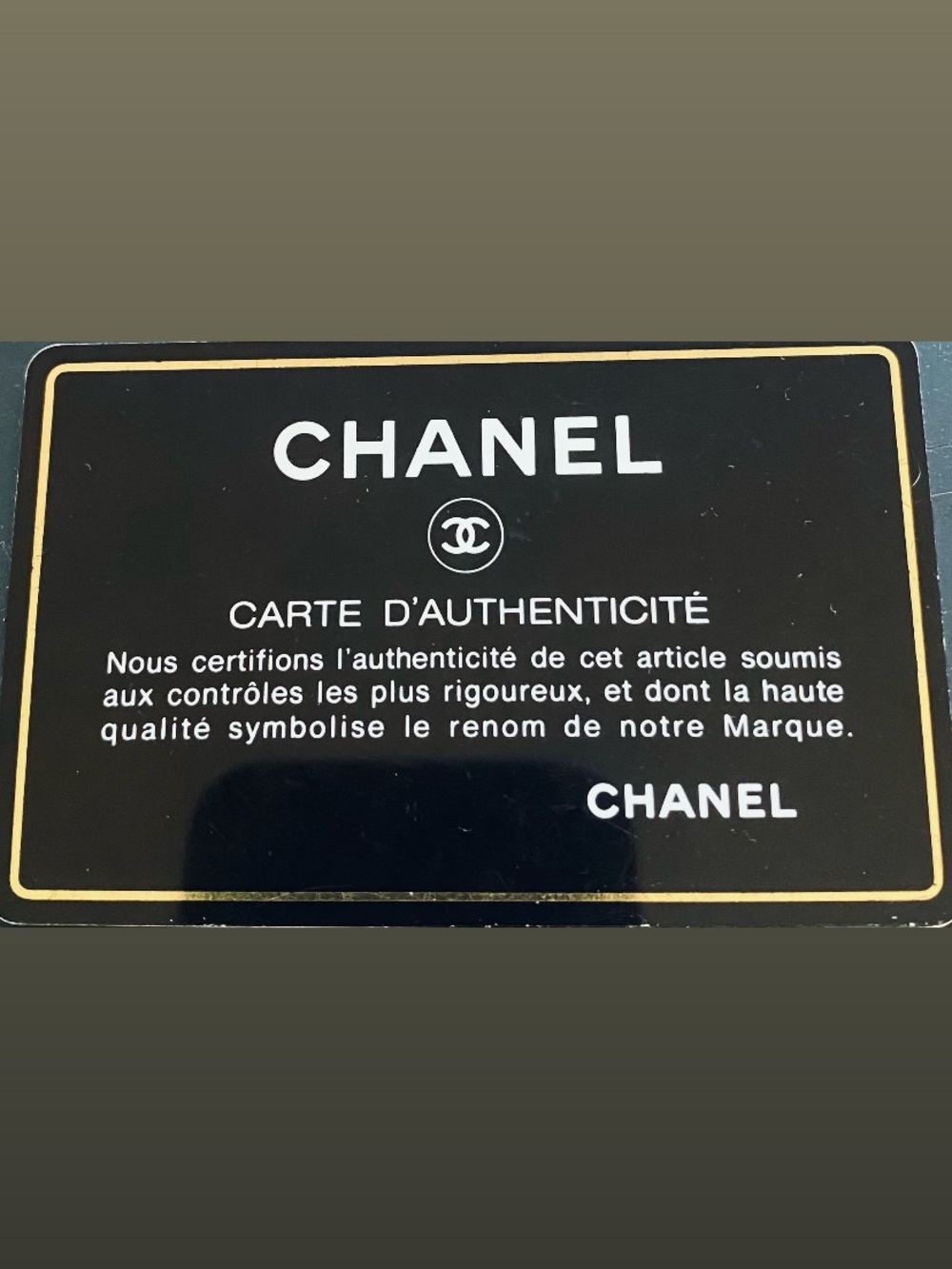 CHANEL Black and Gold Authentication Card